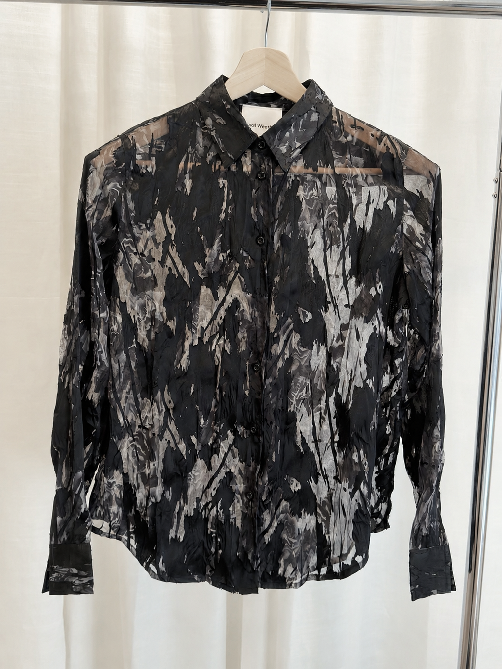 Camisa semitransparente con estampado abstracto flor