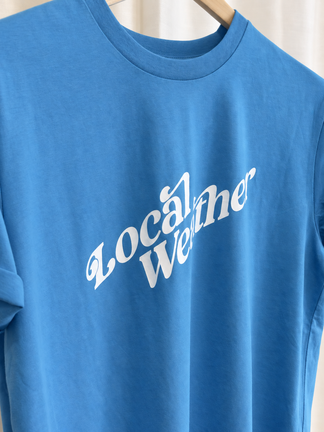 Camiseta azul turquesa de algodón orgánico con logo Local Weather