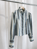 Blusa de rayas con cuello de volante